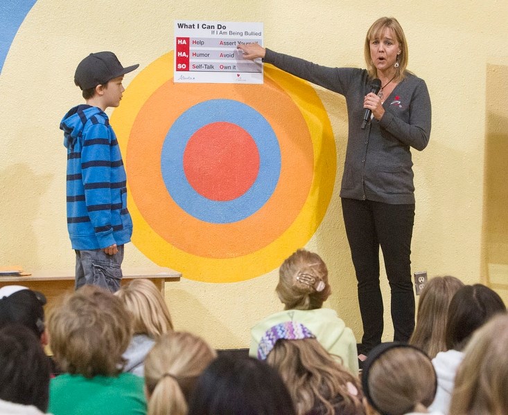 BULLY TALK – Dare to Care founder and anti-bullying expert Lisa Dixon-Wells talks with Grade 5 and Grade 6 students at Leo Nickerson on Thursday. The students participated in 