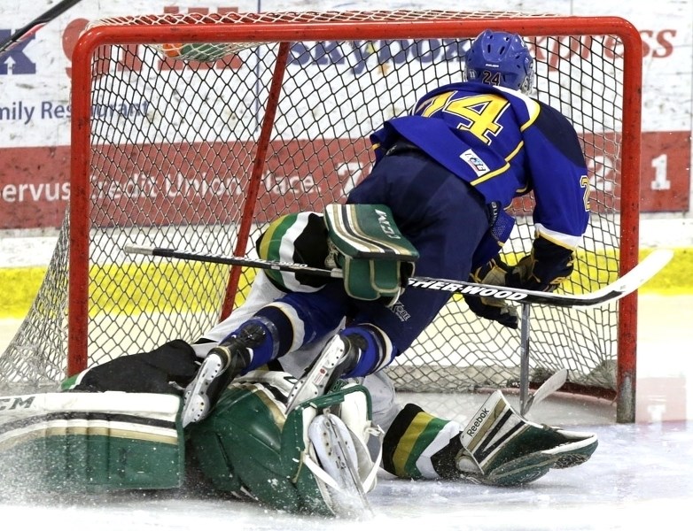 GOAL OF THE GAME &#8211; Casey Reid deposits the puck past Sherwood Park Knights&#8217; netminder Taro Locskai early in the second period to make it 3-2