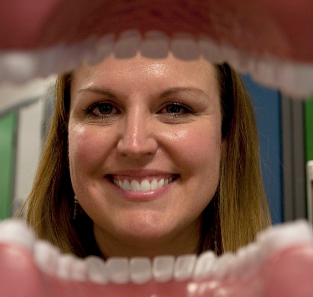 OPEN WIDE –Dental hygenist Tennille Needham was at J.J. Nearing School on Monday afternoon to teach Grade 1 students about proper oral hygiene.