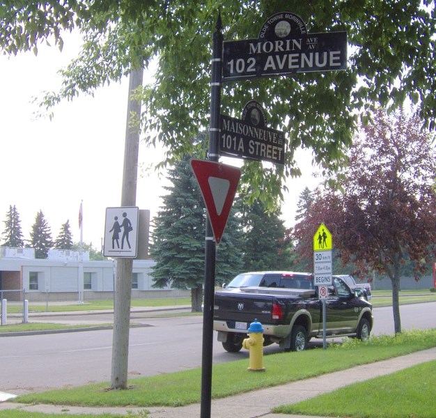 BAD SIGNS – An example of problematic signage in Morinville highlighted by the town&#8217;s recent traffic study. The yield sign is placed next to an intersection with a