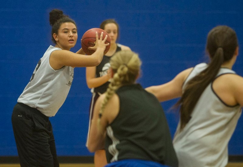 SKYHAWKS TIP-OFF SEASON – Riki Steward of the St. Albert Skyhawks eyes up a pass during a practice session this week at the SkyDome. The 4A provincial bronze medallists and
