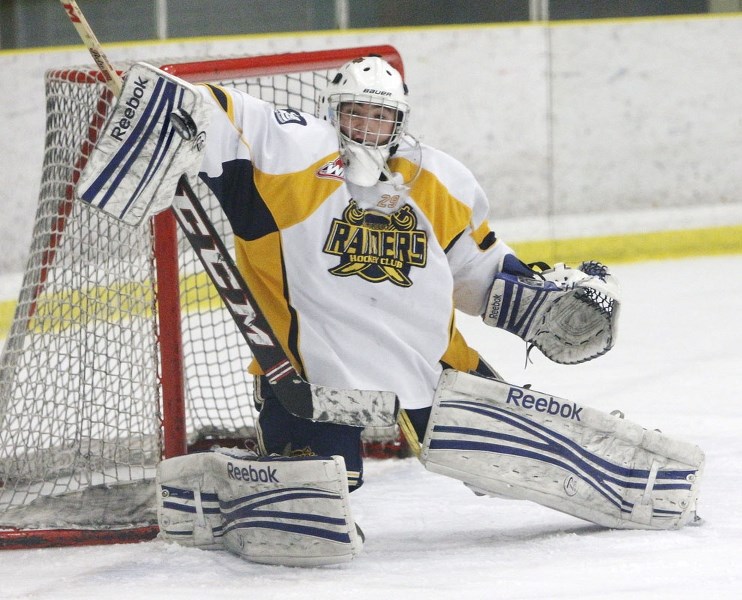 SHOT STOPPER – Colton Girard makes a blocker save for the St. Albert Gregg Distributors Sabres in Tuesday&#8217;s 3-2 loss to the Spruce Grove PAC Saints at Akinsdale Arena.