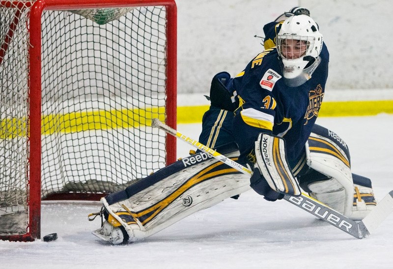 IRON STOPPER – Josh Dechaine of the St. Albert Raiders watches the puck hit the post in Saturday&#8217;s midget AAA game against the Leduc Oil Kings at Akinsdale Arena. Leduc 