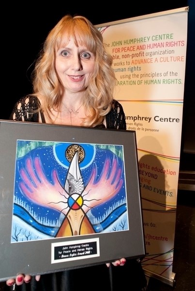 CHILDREN&#8217;S CHAMPION – St. Albert resident Velvet Martin presents the human rights award she received Wednesday from the John Humphrey Centre at the ATB Financial Arts