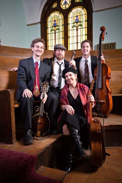 Once again Back Porch Swing gets ready to perform at the sixth annual New Year&#8217;s Eve Concert and Fundraiser at McDougall United Church. Producer Penny Malmberg (seated) 