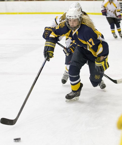 LEADING THE CHARGE – Jamie Jones of the St. Albert Slash heads up ice with the puck during the first annual Slash Alumni Event on Sunday at Go Auto Arena. The Slash are in