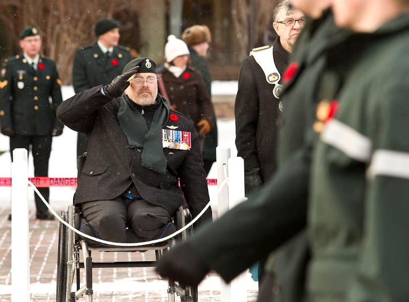 VETERAN SUPPORT – Retired major Mark Campbell (3 PPCLI) salutes during last fall&#8217;s Remembrance Day ceremony at St. Albert Place. Campbell is one of the many injured