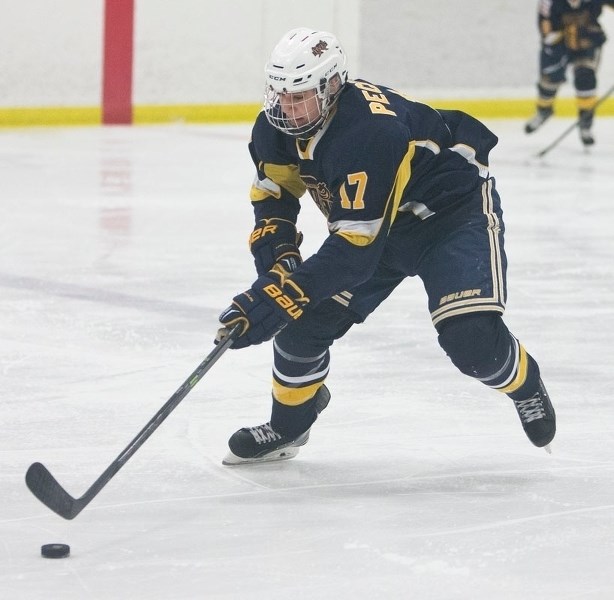 STICKHANDLER – Ryan Peckford of the St. Albert Raiders skates with the puck in Sunday&#8217;s 6-1 victory over the Calgary Buffaloes at Akinsdale Arena. Peckford scored his