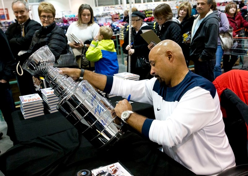 HALL OF FAME SIGNATURE – Netminder Grant Fuhr was signing autographs at Costco in St. Albert recently while promoting his new book