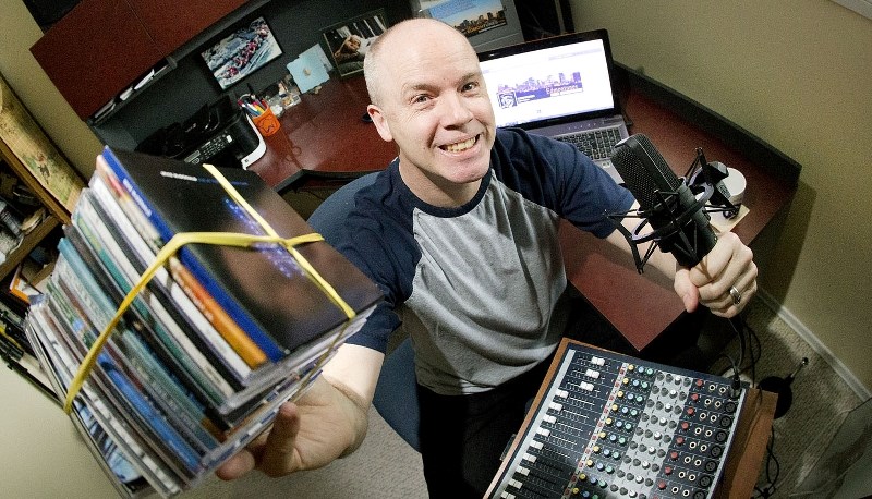 Larry Travis has set up an Internet radio station in his home where he plays music by local artists.