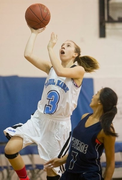 POINT PRODUCER – Allison Hunder goes to the hoop for the Paul Kane Blues in Thursday&#8217;s 94-24 blowout of the Bishop O&#8217;Byrne Bobcats of Calgary at the Paul Kane