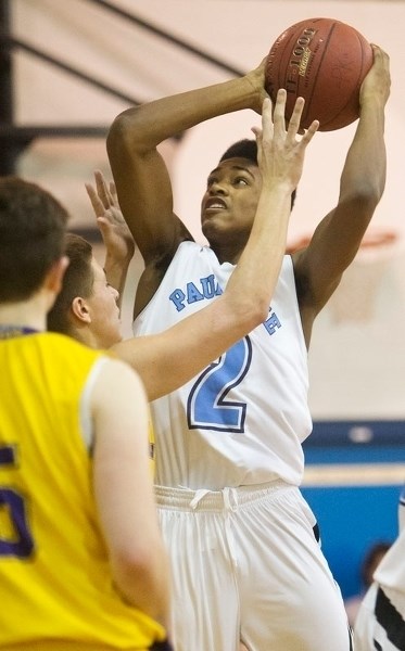 AIMING TO SCORE – Shaydon Philip eyes up a basket for the Paul Kane Blues against the Lloydminster Barons in Thursday&#8217;s opening game at the Paul Kane Classic. Philip