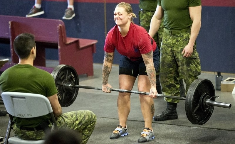 Arla Bergstrom of 1CER lifts 265 lbs. while competing in the powerlifting event Monday. Edmonton Garrison soldiers compete this week in ball hockey