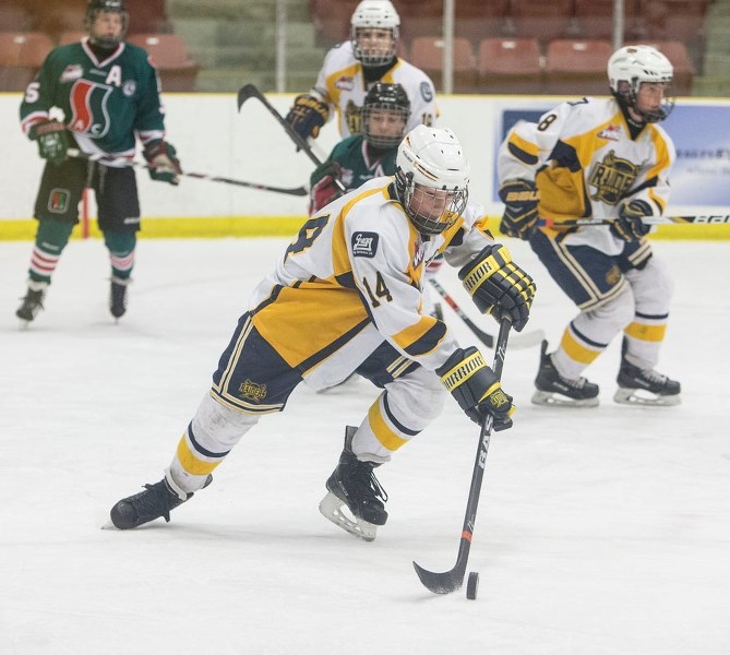 ATTACKER – Eddie Gallagher controls a rolling puck for the St. Albert Gregg Distributors Sabres in Sunday&#8217;s 3-0 loss to the visiting SSAC Southgate Lions in the Alberta 