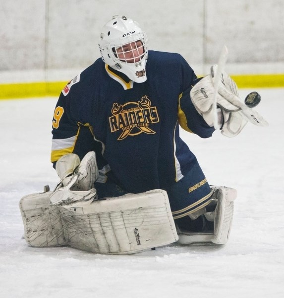 PUCK STOPPER – Ethan Crotty uses his blocker to stop a shot for the St. Albert Raiders (16-6-7)