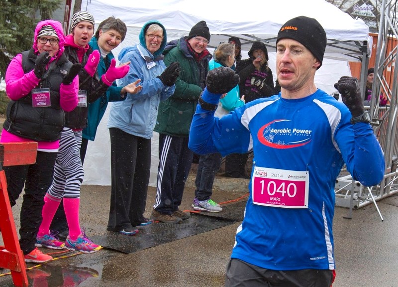 RUNWILD MARATHONER – Marc Meunier of St. Albert celebrates his third Leading Edge RunWild marathon victory in four years in 2014. The marathon race has been dropped from the