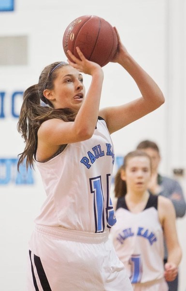 Paige Derworiz shoots for the hoop for the Paul Kane Blues