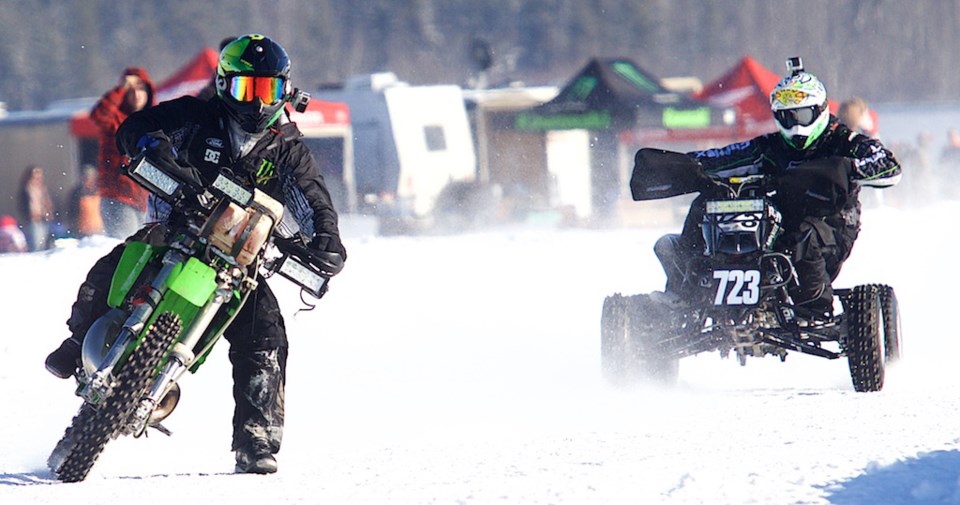 ICE RACE FATALITY —-A shot of two unidentified racers at last weekend&#8217;s Numb Bum 24 Hour ice race during the early hours of the race. The normally 24-hour affair was