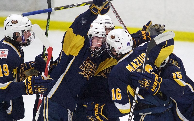 GOAL GETTERS – The St. Albert Raiders celebrate their first goal in Wednesday&#8217;s 3-0 victory against the Grande Prairie Storm at Akinsdale Arena. Cam Mazur (16) opened
