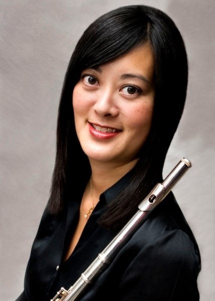 New Edmonton Wind Sinfonia flautist Crystal Krips was raised in Saskatchwan and moved to St. Albert at the turn of the century. In addition to performing with NEWS