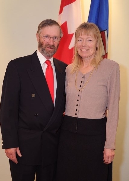 International Women&#8217;s Day Award recipient Louise Horstman stands beside her husband