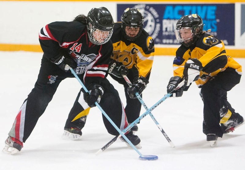 BELLE RINGER – Sara DeRose of the St. Albert Mission controls the ring against the Central Alberta Sting in Sunday&#8217;s bronze-medal game at the Ringette Alberta belle