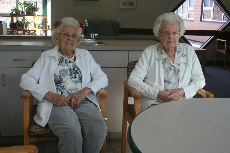 RESIDENTS – Chateau Mission residents Agnes Friesen (left) and Hazel Manning say they&#8217;re happy knowing fire sprinklers will be installed in the building.