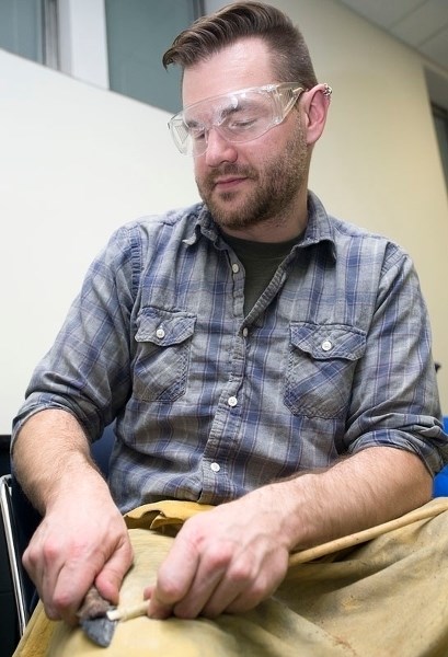 HANDCRAFTED &#8211; Local archaeologist Kurtis Blaikie-Birkigt working during an archaeological stone tool building workshop at the University of Alberta on Saturday.