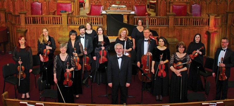 The Alberta Baroque Ensemble closes its landmark 35th season on Sunday with Haydn and Company. Participating St. Albert cellist Ronda Metszies stands behind music director