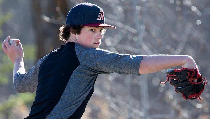 PLAY BALL – Conor Bronson of the St. Albert Cardinals throws the ball at Wednesday&#8217;s midget AAA practice at Legion Memorial Park. Bronson is one of eight newcomers on