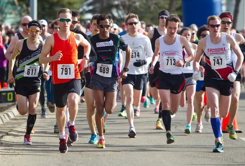 LEADERS OF THE PACK – Runners in the Tech Shop 10-miler bolt from the start line