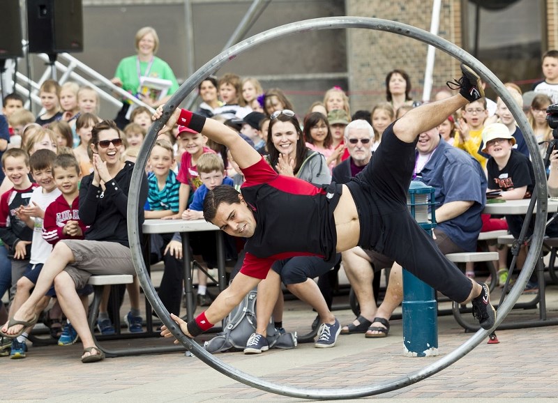 PERFORMER – Daniel Craig from Street Circus was just one of the performers to start the kickoff for the International Children&#8217;s Festival in 2013.