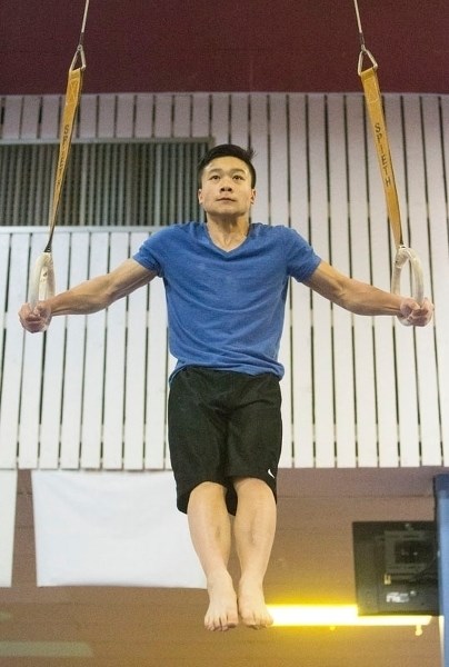 LORD OF THE RINGS – Isaiah Wong of the Dynamyx Gymnastics Club of St. Albert works on his Iron Cross routine during Monday&#8217;s training session. At provincials recently