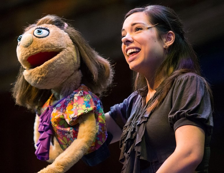 Rachel Bowron as Kate and Lucy acts out a scene during a media call for their upcoming production Avenue Q at the Citadel Theatre on Tuesday.