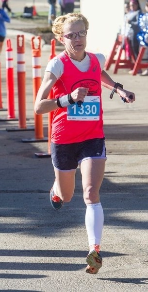FEMALE CHAMPION – Shannon Maisano of St. Albert was the first female to cross the Victory Lane finish line during the fifth annual Leading Edge RunWild half-marathon in one