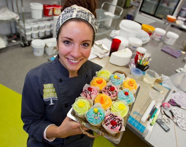 Over the Top&#8217;s decorator Jocelyne Leyte shows off some cupcakes.