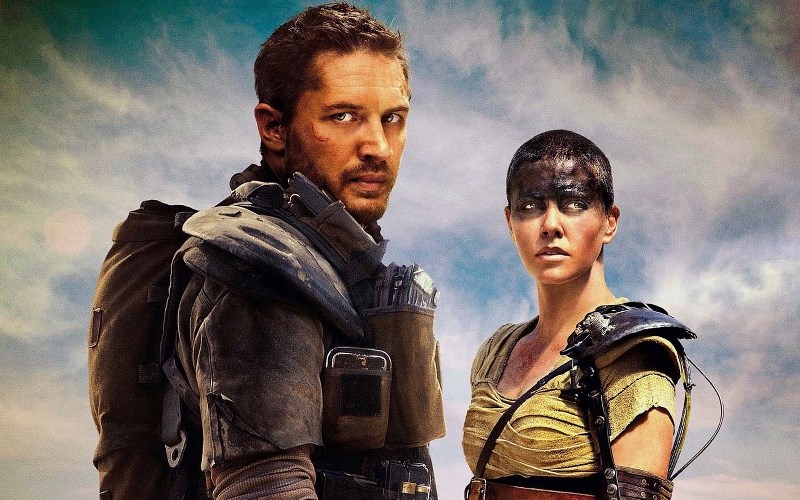FURY ROAD – Mad Max (Tom Hardy) and Imperator Furiosa (Charlize Theron) look for water