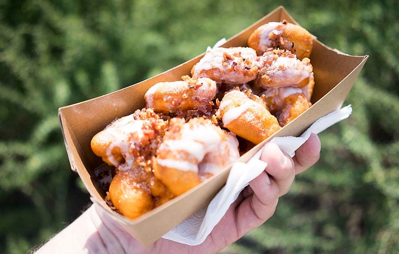 MMM â€¦ BACON – A plate full of bacon maple-frosted mini-donuts served at the Rainmaker Rodeo last weekend.