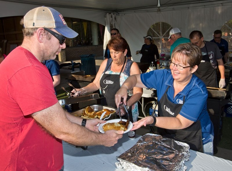 Attendees at this year&#8217;s St. Albert Gazette Pancake Breakfast brought in more food and cash donations than last year.
