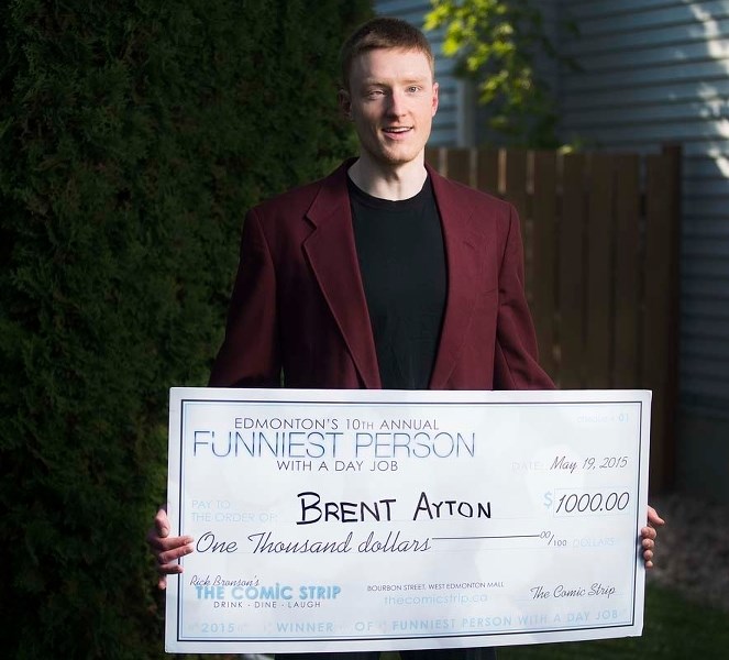 Brent Ayton shows off his prize jacket for taking the top spot at this year&#8217;s Funniest Guy with a Day Job contest