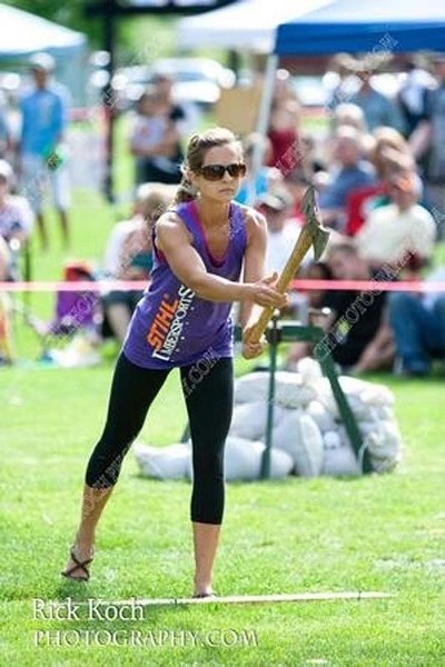 Guys look menacing when they throw an axe. Instead the petite Kat Spencer