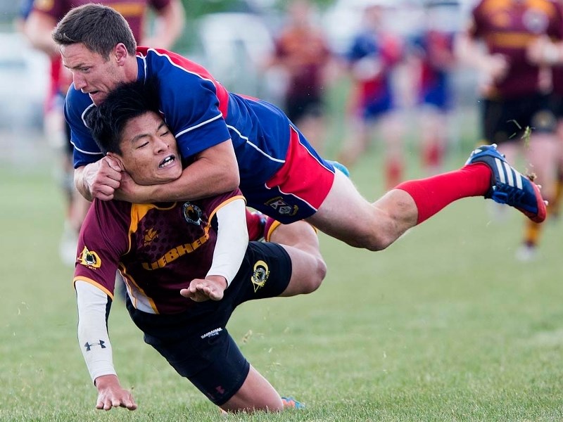 SQUEEZE PLAY &#8211; Jake Robinson of St. Albert applies a choke hold on Kevin Leon-Tang of the Nor&#8217;Westers in Saturday&#8217;s Alberta Cup premier men&#8217;s match at 