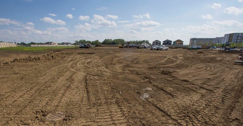 UNDER CONSTRUCTION – Site preparation continued at the Lois E. Hole Elementary School site this week. It&#8217;s one of many major school construction projects now in