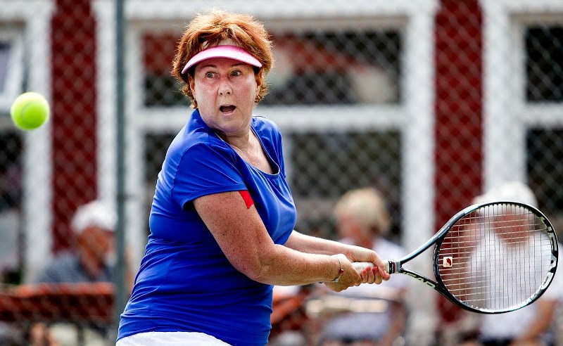 TENNIS TOURNAMENT – Lisette Turcotte lines up with the ball during the annual tennis tournament at the St. Albert Tennis Club on Sunday.