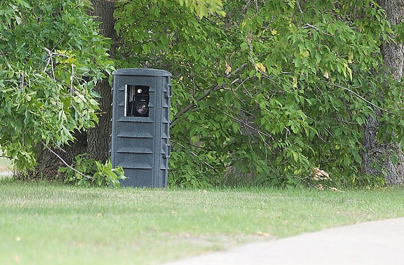 PHOTO RADAR &#8211; A new style of mobile photo radar equipment is seen in action along Sir Winston Churchill