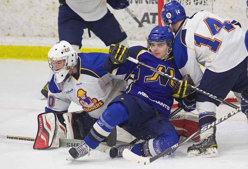 CREASE WORK – Blair Johnson of the St. Albert Merchants created a traffic jam in the Leduc Riggers&#8217; crease during a Capital Junior B Hockey League game Jan. 25 at