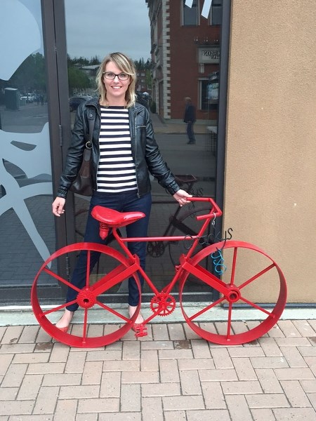 Joanne Guthrie&#8217;s welded red bike was put on display at Cranky&#8217;s Bike Shop during the Farmers&#8217; Market on Saturday.