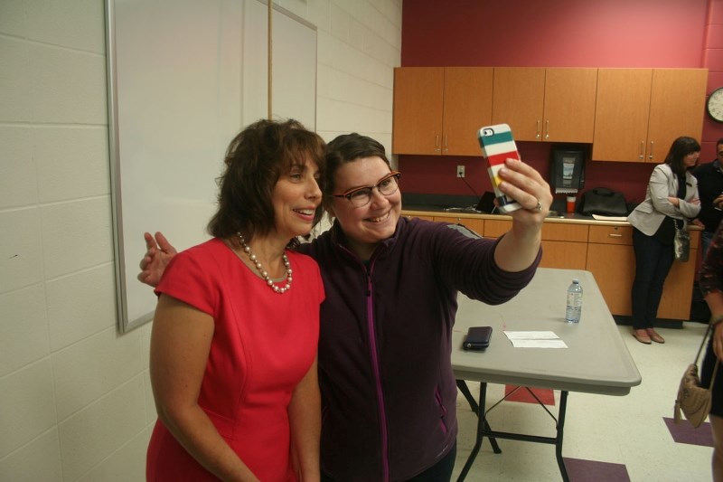 NDP supporter Alexandria Fisher-Thomson takes a selfie with St. Albert-Edmonton NDP candidate Darlene Malayko following her Saturday-afternoon nomination.