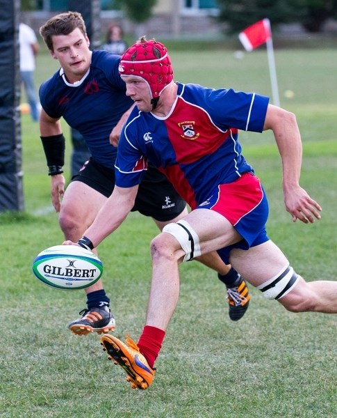 FINISHER – St. Albert captain Orrin Farries races toward the try area to score the second try of the match for the premier men&#8217;s team in Thursday&#8217;s 37-5 victory