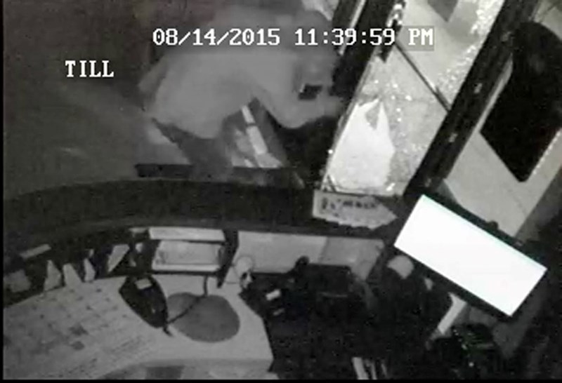 Police are looking for a man with a cut on his arm who broke into the Hair By Design salon on Aug. 15.